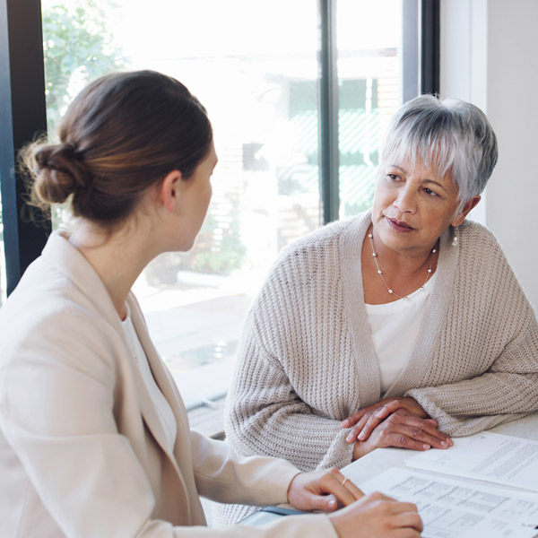 woman talking to lawyer